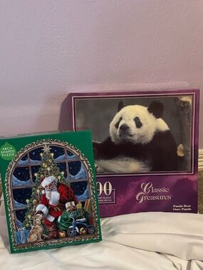 Puzzles, 1000 pieces, Santa and his dog. The other is Panda